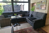 Sitzen im Wintergarten